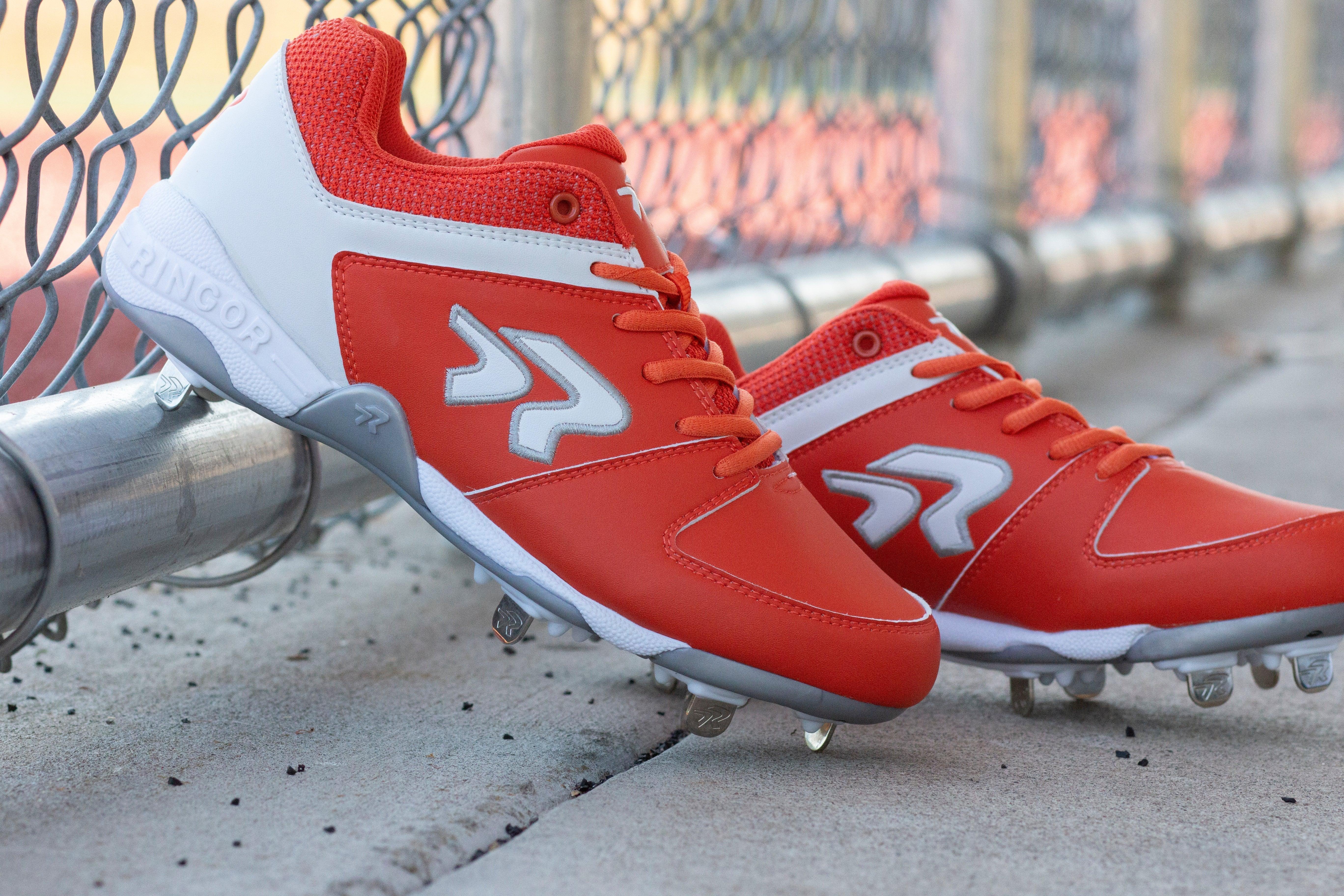 Red metal hot sale softball cleats